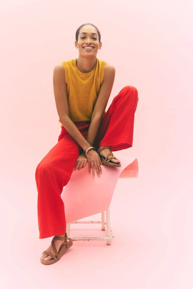 Discover how to style red linen pants with these effortlessly chic outfit ideas. From casual everyday looks to elevated summer styling, explore flattering combinations, must-have accessories, and fashion-forward ways to wear this bold wardrobe staple with confidence. Red Linen Pants With Black Top, Red Top With Linen Pants, White Linen Pants With Red Top, Linen Pants With Red Shoes, Outfits With Red Linen Pants, Red Tank Top With Linen Pants, Red Linen Pants Outfit Summer, Red Linen Pants Outfit Work, Red Linen Pants Outfit Casual, Red Linen Pants Outfit Winter, Red Linen Pants Outfit Men, Red Linen Pants Outfit Fall, Red Linen Pants Set, Red Linen Pants Beach Outfit, Red Linen Pants Outfit Ideas, Red Linen Pants Styling