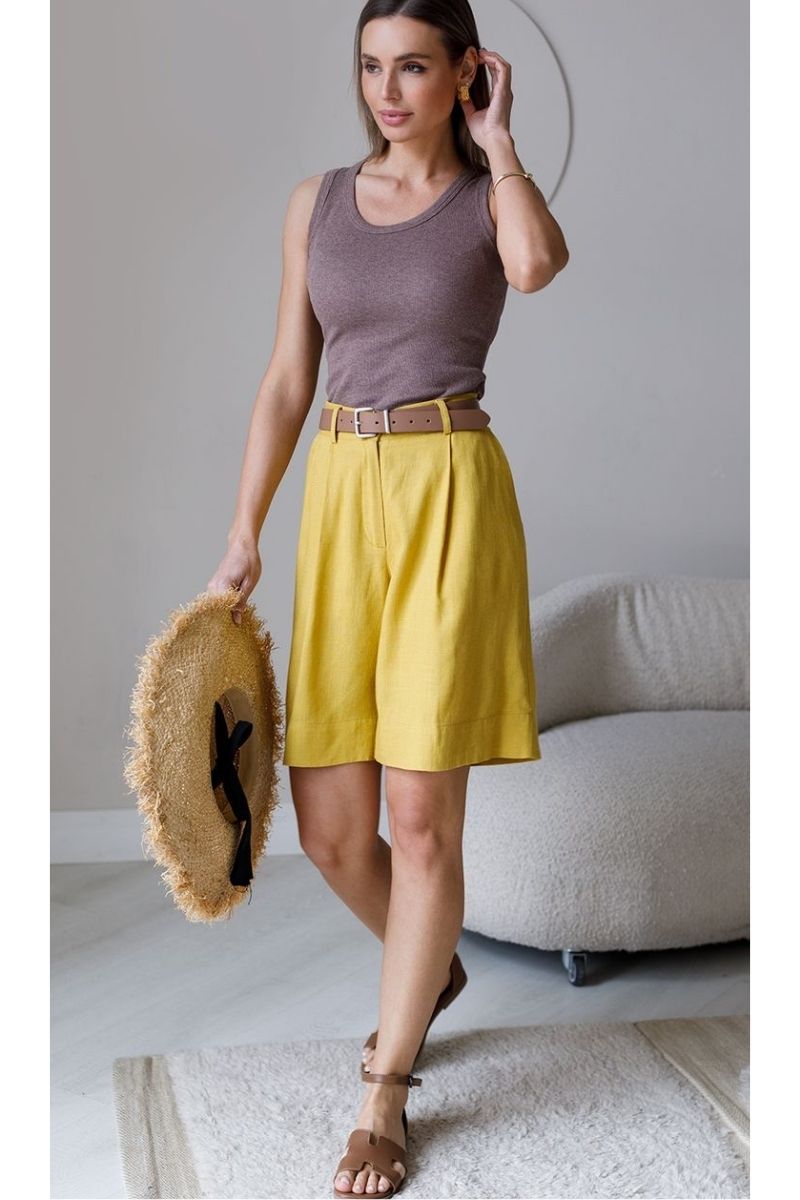 Discover chic and effortless ways to style yellow Bermuda shorts with outfit ideas that feel polished, modern, and wearable. From tailored blazer looks to relaxed summer styling, explore versatile combinations, styling tips, and must-have accessories to elevate your wardrobe this season. Yellow Bermuda Shorts Outfit, Yellow Bermuda Shorts Outfit Women, Bermuda Shorts Yellow, How To Style Yellow Bermuda Shorts, Styling Yellow Bermuda Shorts, Butter Yellow Bermuda Shorts, How To Style Butter Yellow Bermuda Shorts, Butter Yellow Bermuda Shorts Outfit, Style Yellow Bermuda Shorts, What Goes With Butter Yellow Shorts, What Goes Well With Yellow Shorts, What Color To Wear With Yellow Shorts